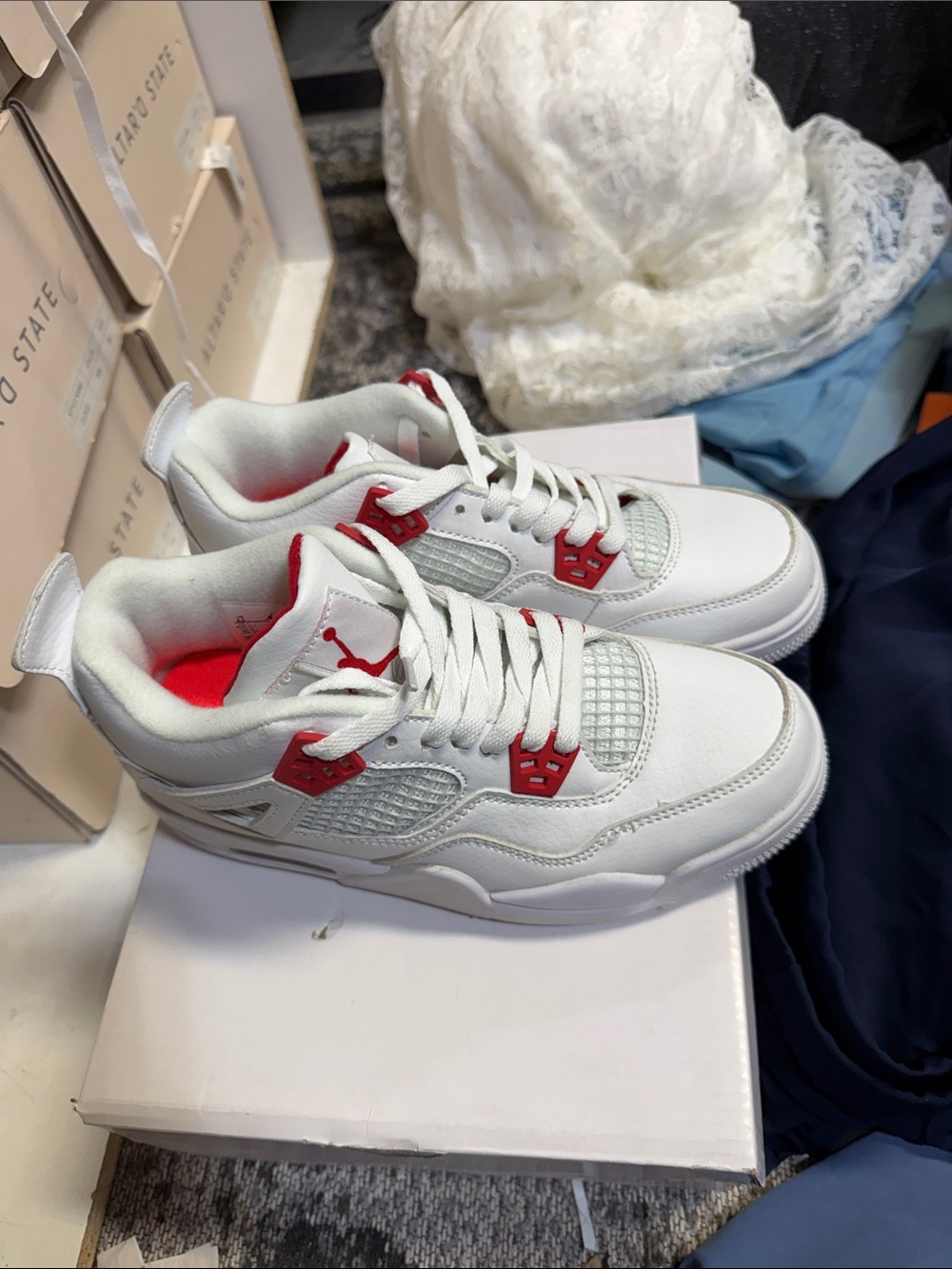 Nike Jordan 4 White and Red Retro Basketball Sneakers - Picture 4 of 6